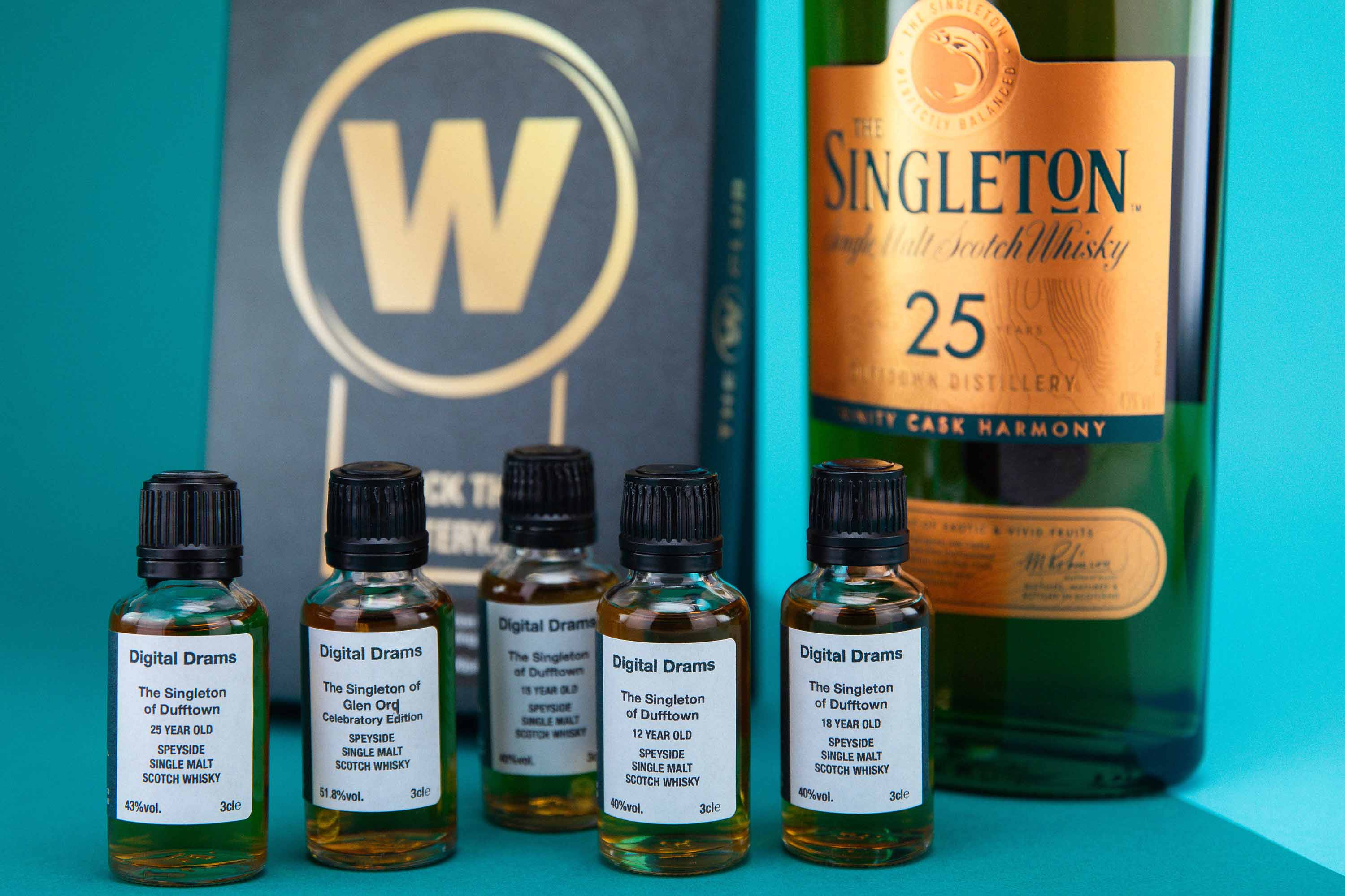 An image showing the five 3cl samples that come with the Digital Drams Singleton and Popcorn, along with a picture of the Singleton 25 Year Old 70cl